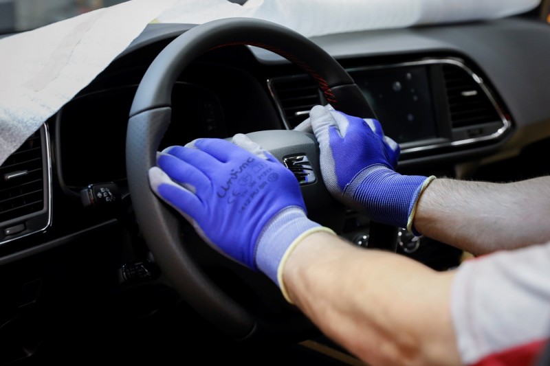 Seat car plant drone delivers steering wheel