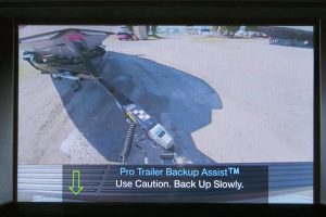 Pro Trailer Backup Assist helps take the frustration out of backing up with a trailer. It works by letting the customer steer the trailer with a control knob while the Expedition steers its wheels and limits vehicle speed. To operate Pro Trailer Backup Assist, the driver rotates a knob to indicate how much the system should turn the trailer, then the technology automatically steers the Expedition to turn the trailer the desired amount. The system can limit vehicle speed to enhance occupant comfort over various road surfaces. The result is less time required to back up a trailer along with added driver confidence; the technology can even help towing experts by reducing time lost to maneuvering mistakes.