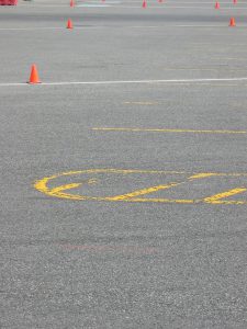 Cones forming a driving track in a parking lot