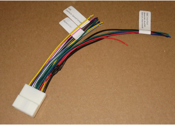 Subaru/Nissan Headunit/Radio Wiring Harness on a wooden background