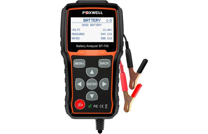 Foxwell car battery tester with a screen, buttons, and connector claws to battery