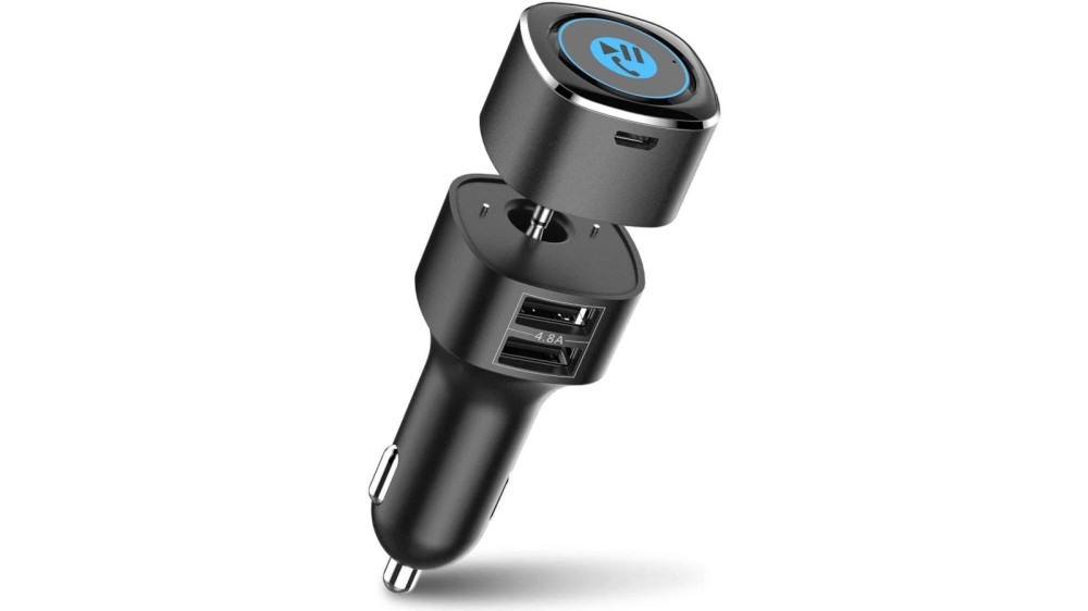 Black Bluetooth aux receiver with 12V charging adapter and two USB charge ports.