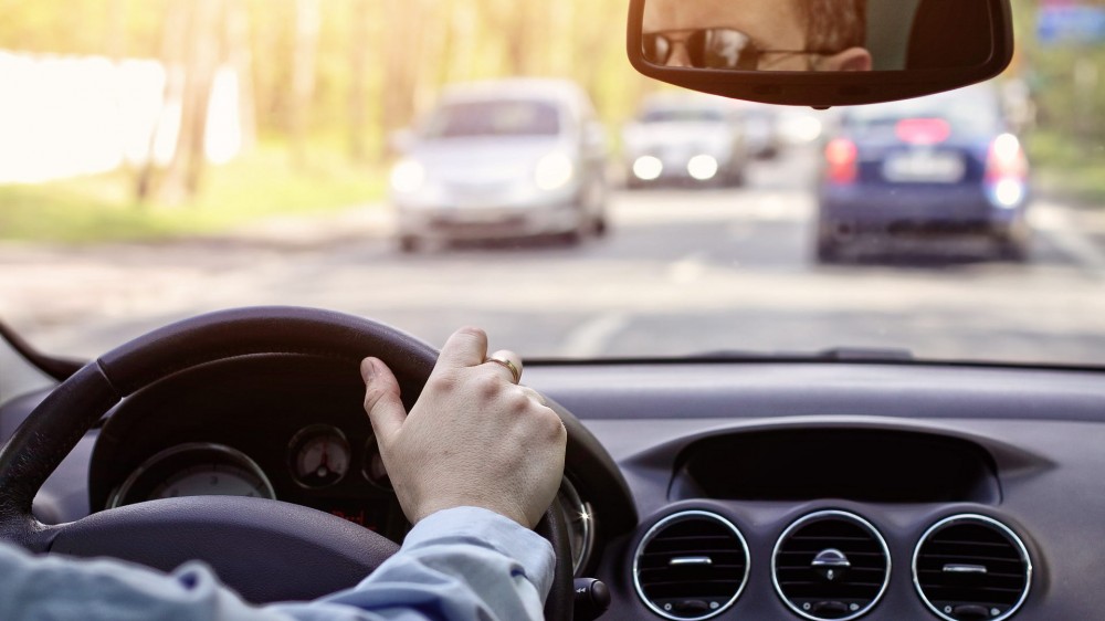 driving a car on a sunny day