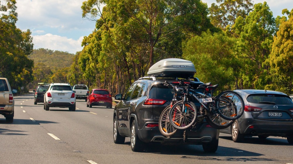 Car with cargo rack and bikes mounted