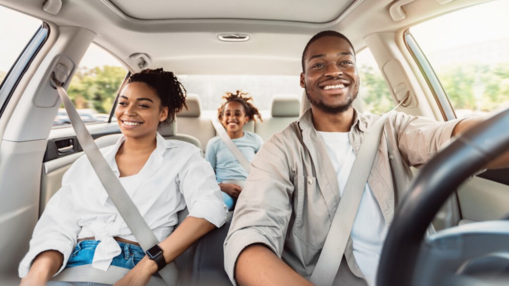 Happy African American Family Riding Car Traveling On Weekend, Panorama