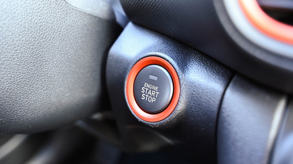 Engine start stop button in a car